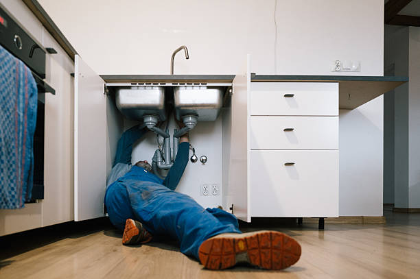 Professional Drain Cleaning technician working in Saint David, IL